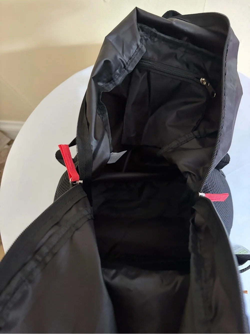 Foldable Black Travel Backpack with Red Accent